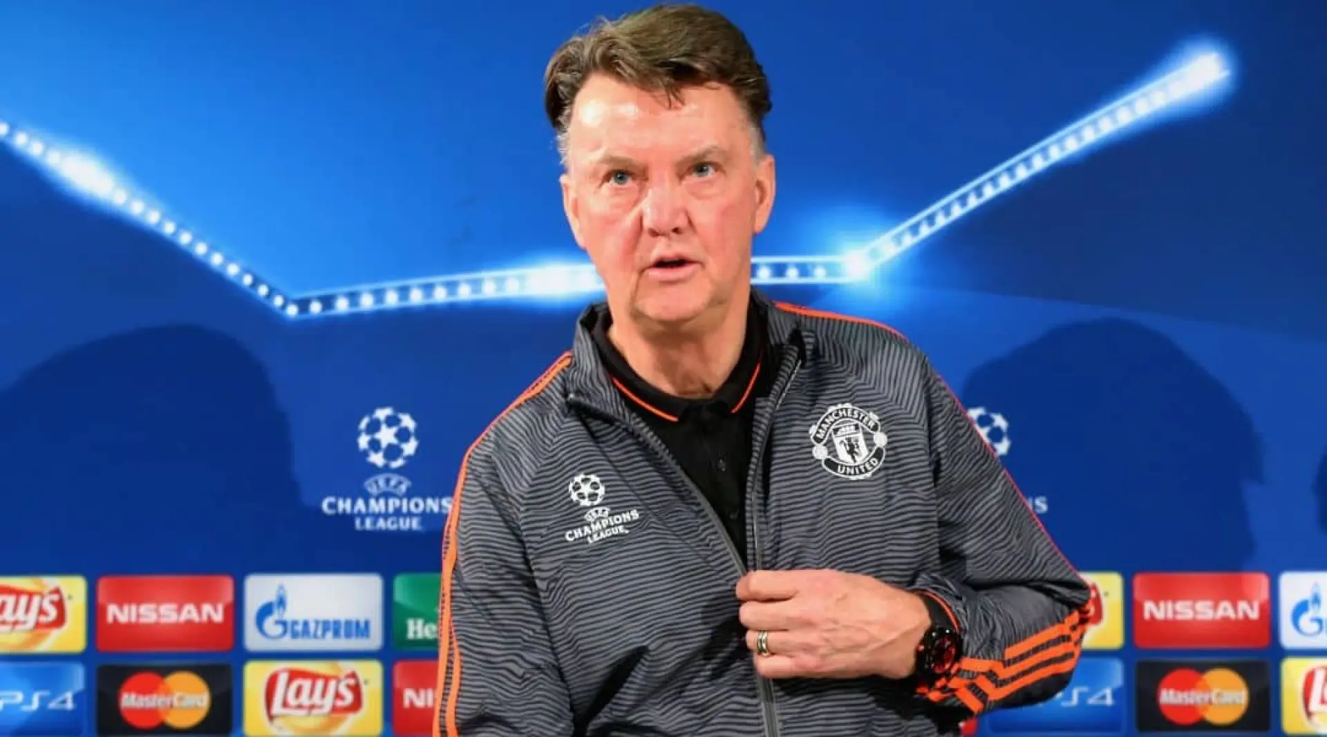Louis van Gaal stands during a Man Utd press conference