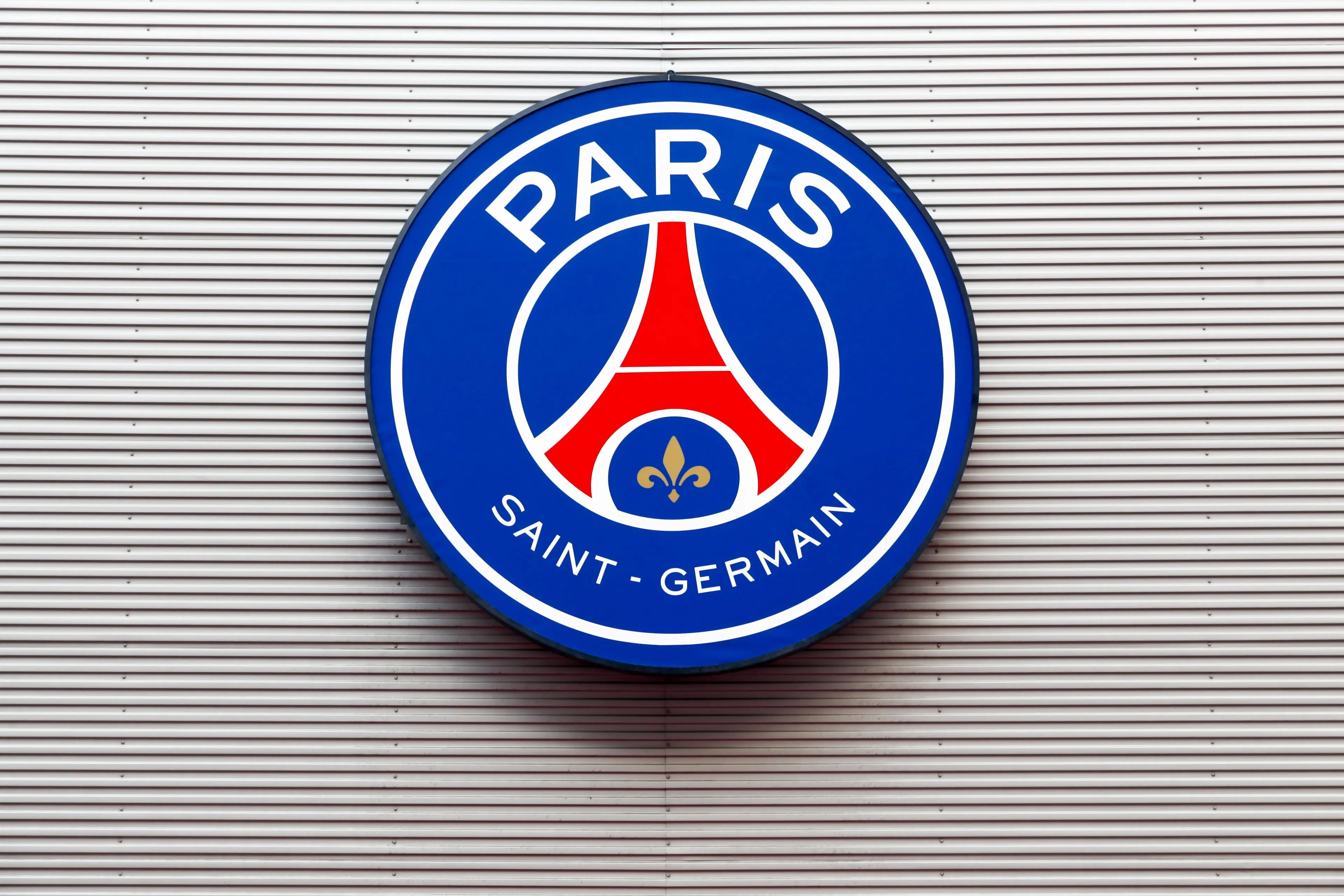 PSG logo on the wall of Parc des Princes in Paris, France