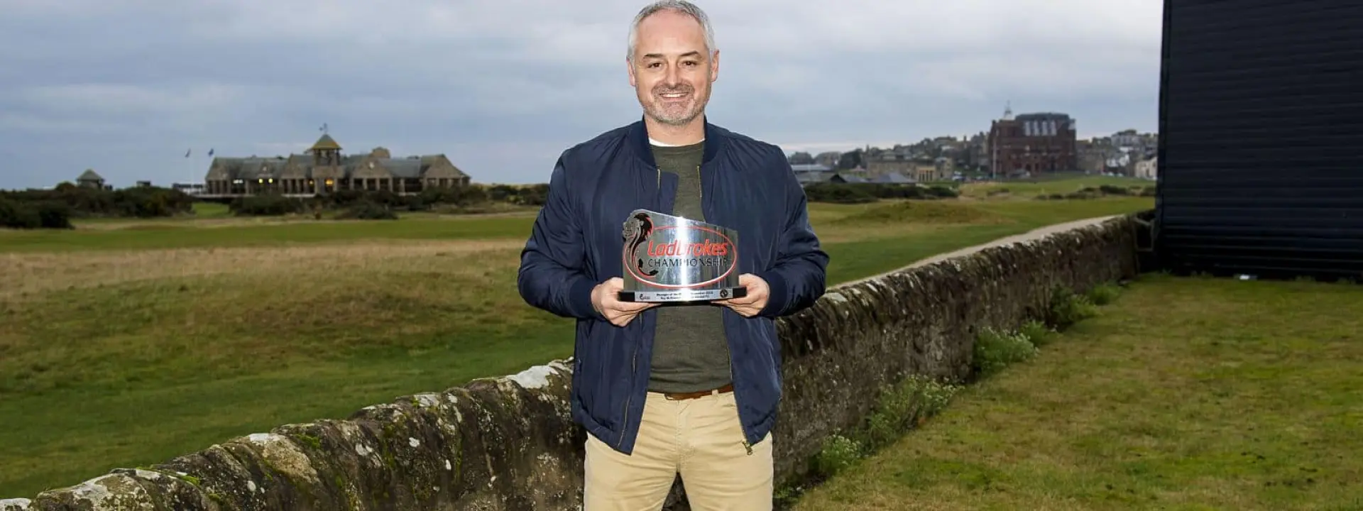Dundee United manager Ray McKinnon shows off his Ladbrokes Championship Manager of the Month award
