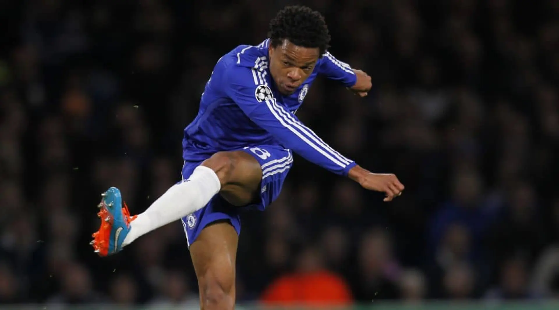 Loic Remy shoots and scores or Chelsea in the Champions League