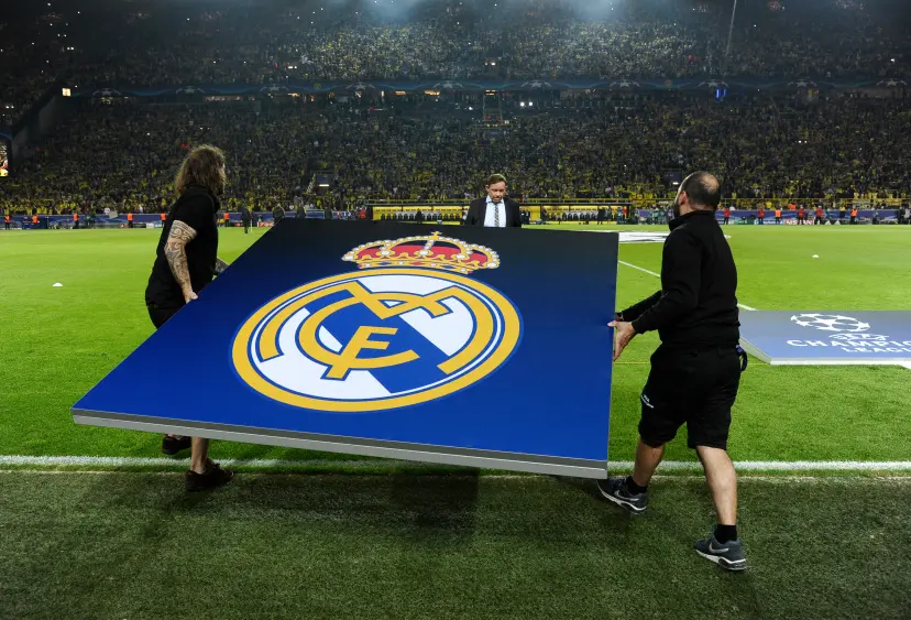 Signal-Iduna Arena Dortmund Germany , 27.9.2016, UEFA Champions League Season 2016/17, Group stage, matchday 2 - Borussia Dortmund (BVB) vs. Real Madrid --- workers position the Real Madrid logo on the pitch