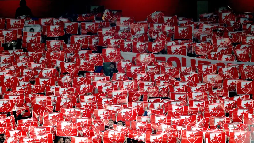 Red Star Belgrade fans show support for their team in the stands