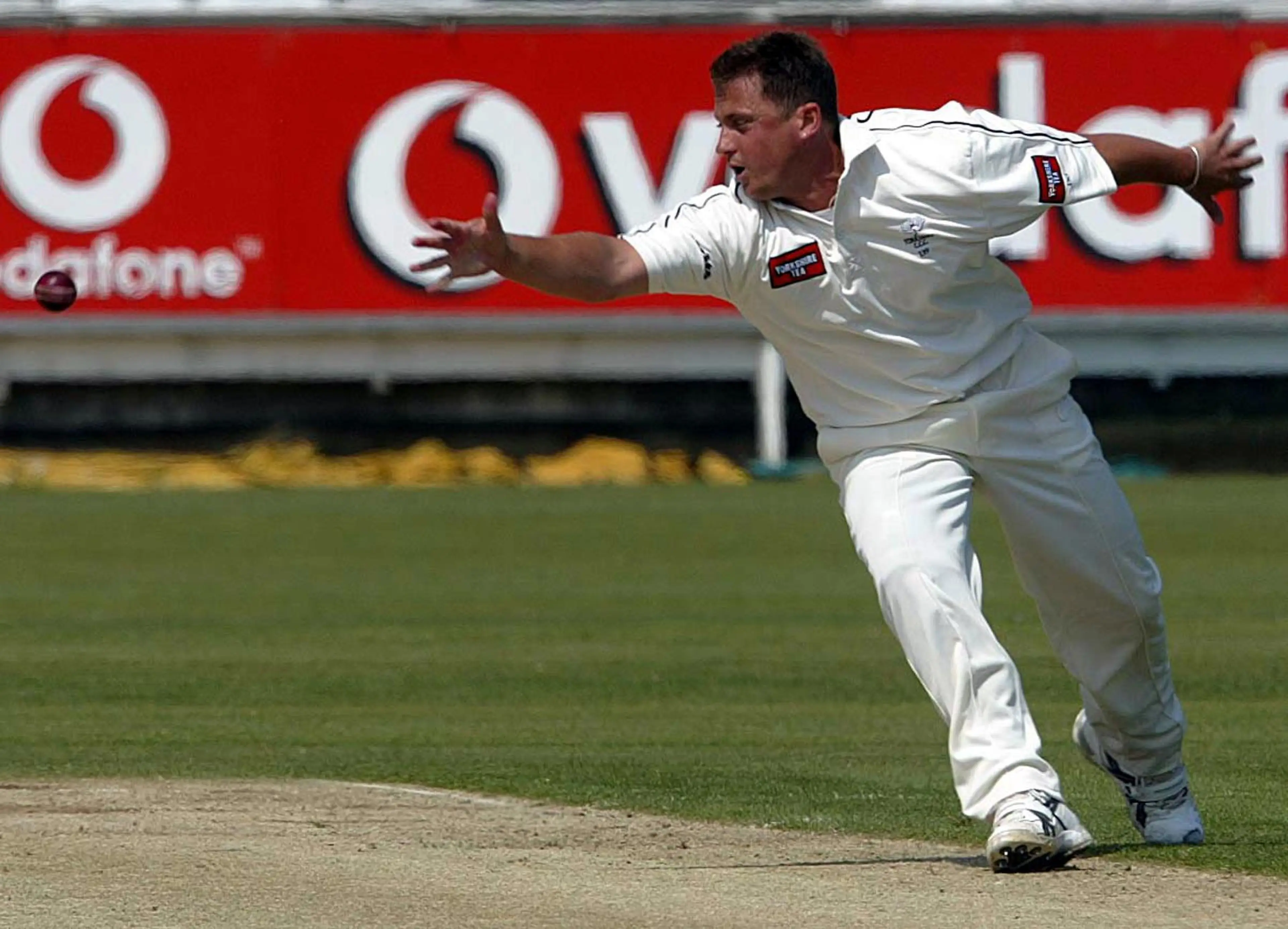 Yorkshire and England player Darren Gough just misses the ball after bowling against Durham at the Riverside in Chester-Le Street