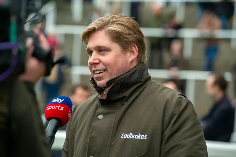 Ascot, Berkshire, UK. 19th November, 2021. This was a special day for racehorse trainer Dan Skelton (pictured) as today he celebrated having his 1,000th win with horse Faivoir ridden by jockey Harry Skelton winner of the Windsor Horse Rangers Novices' Limited Handicap Steeple Chase. Faivoir owner Mrs Suzanne Lawrence. Trainer Dan Skelton, Alcester.