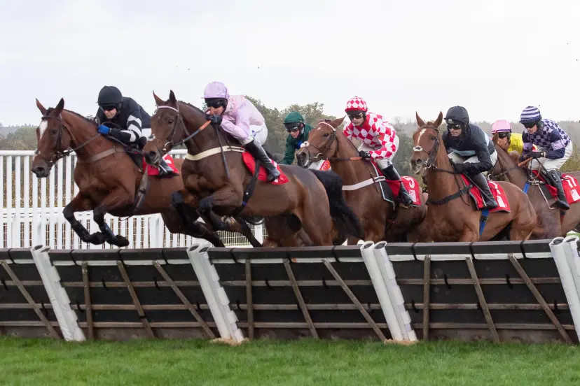 Ascot, Berkshire, UK. 4th November, 2023. Horses Mighty Moth (L) and TellHerTheName (R) clear a hurdle in the GL Events Novices' Hurdle Race (Class 3) (GBB Race) at Ascot Racecourse at the Fireworks Spectacular Family Raceday