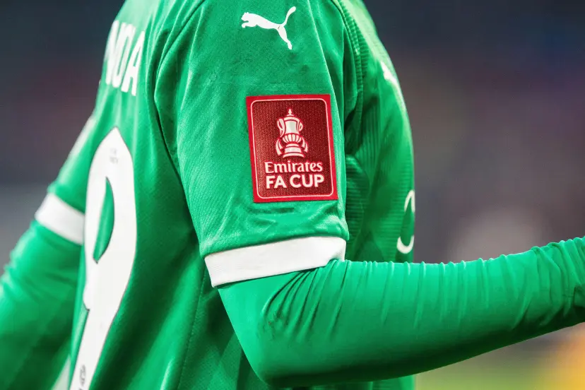 The Emirates FA Cup Badge on the sleeve of a Plymouth player in Brentford FC VS Plymouth Argyle