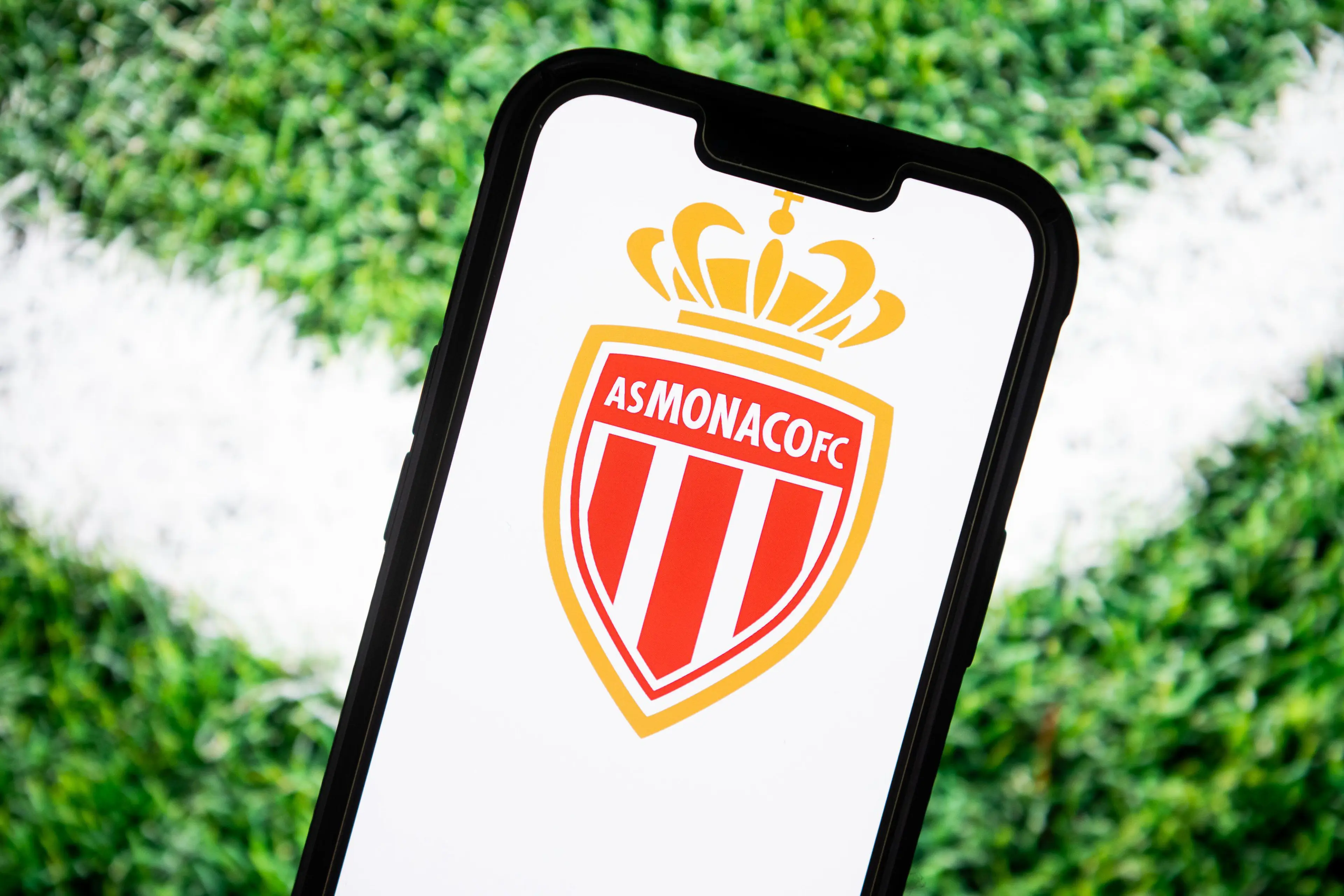 AS Monaco football club logo seen displayed on a smartphone